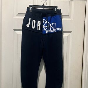 Jordan kids youth Navy Blue Joggers. Side and one back pocket.